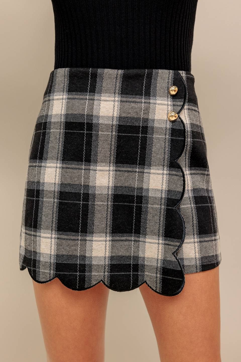 A woven plaid skort